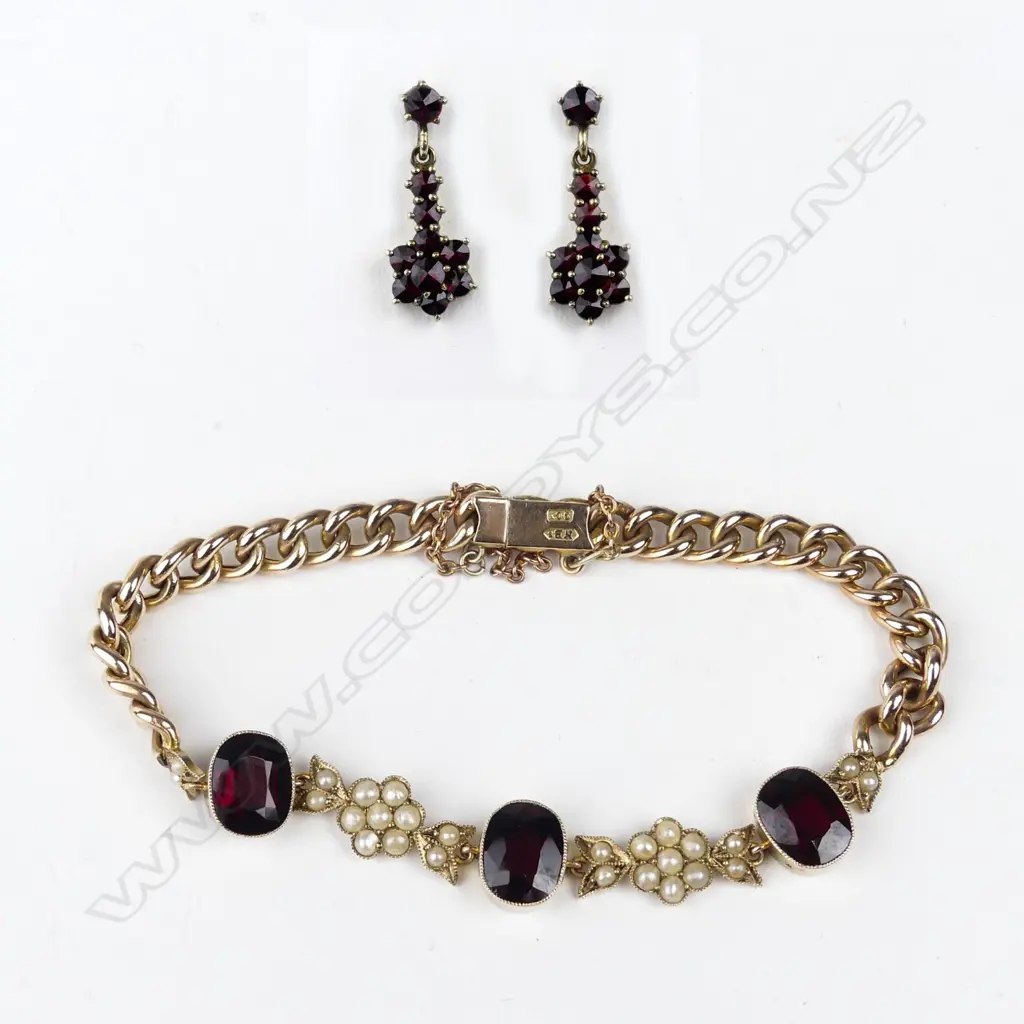 A 9ct rose gold garnet and pearl bracelet Image 1++