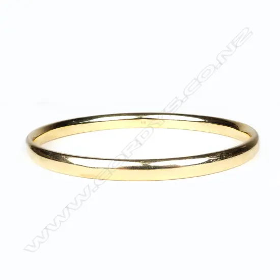 A 9ct gold bangle