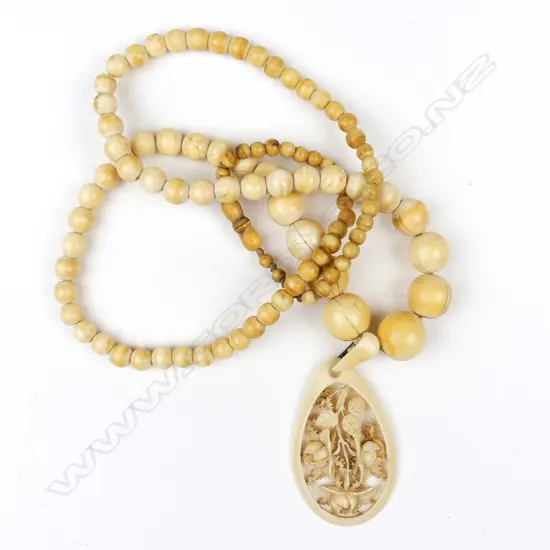 A vintage ivory bead necklace