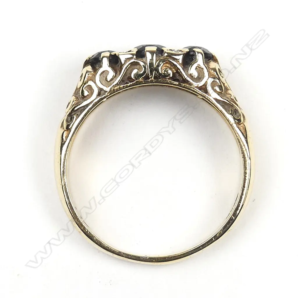 A 9ct gold diamond and tourmaline ring Image 1++