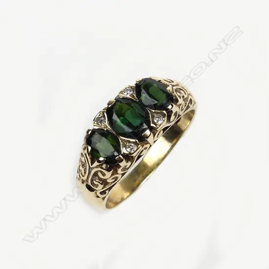A 9ct gold diamond and tourmaline ring