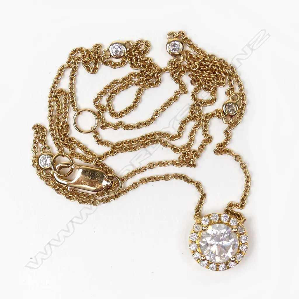 An 18ct gold and diamond necklace Image 1++