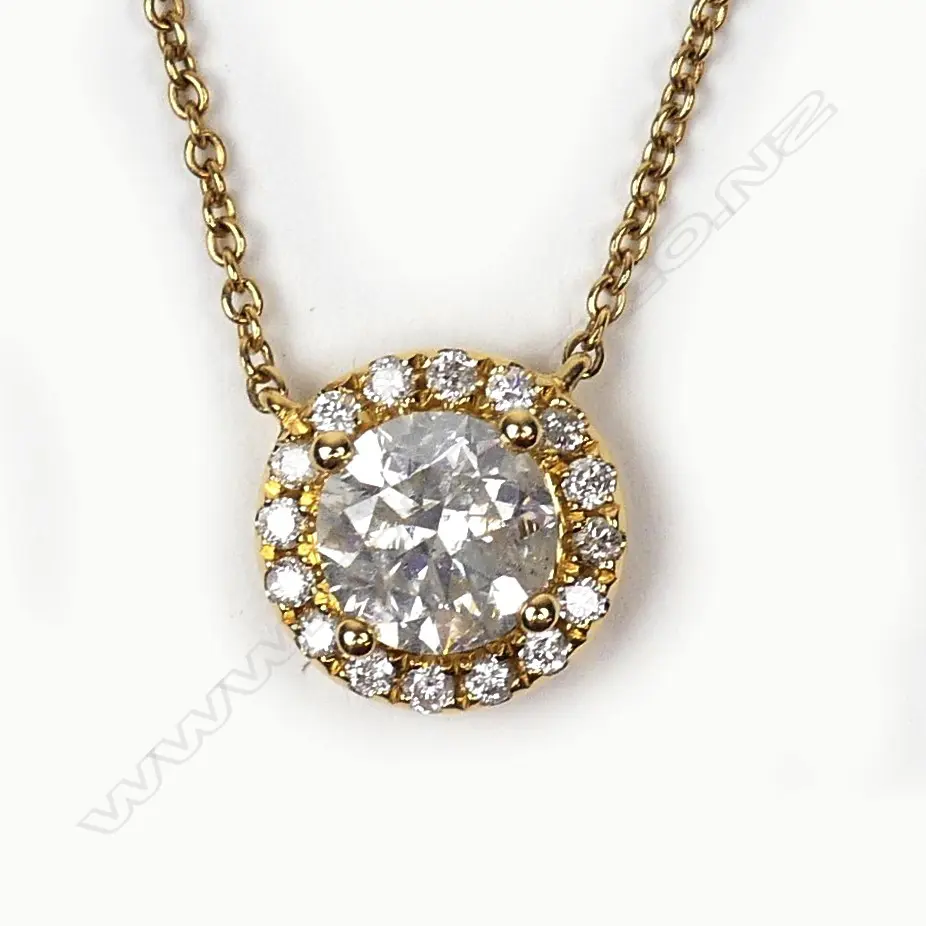 An 18ct gold and diamond necklace Image 1++