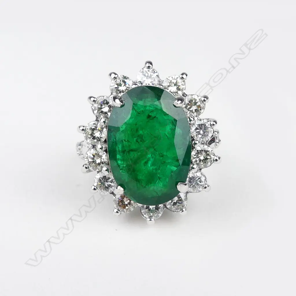 A 9ct white gold emerald and diamond ring Image 1++