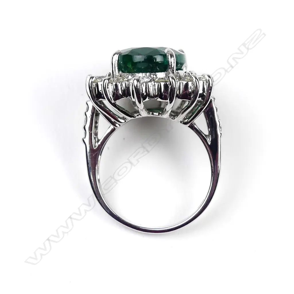 A 9ct white gold emerald and diamond ring Image 1++