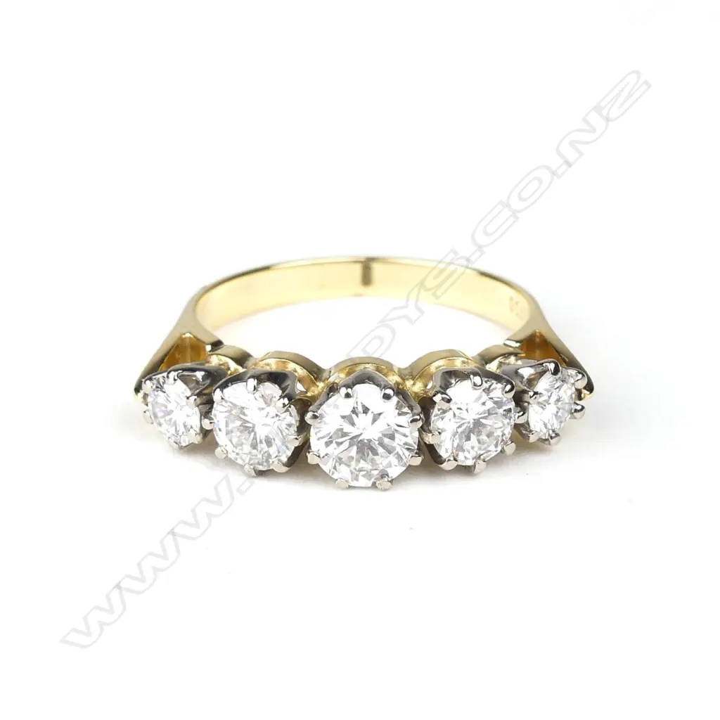 An estate 18ct gold and five stone diamond ring Image 1++