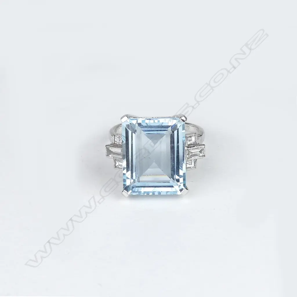 An 18ct white gold aquamarine and diamond Art Deco style ring Image 1++