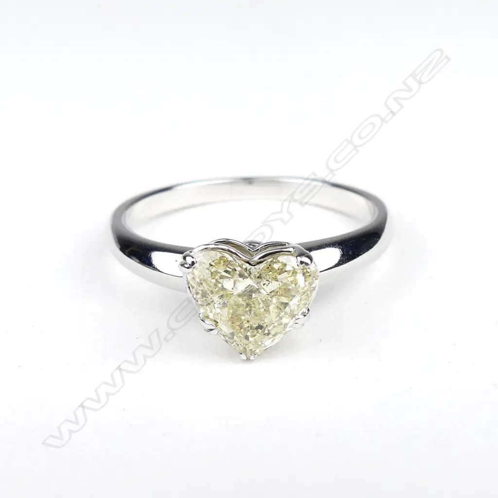 A 14ct white gold diamond solitaire ring Image 1++