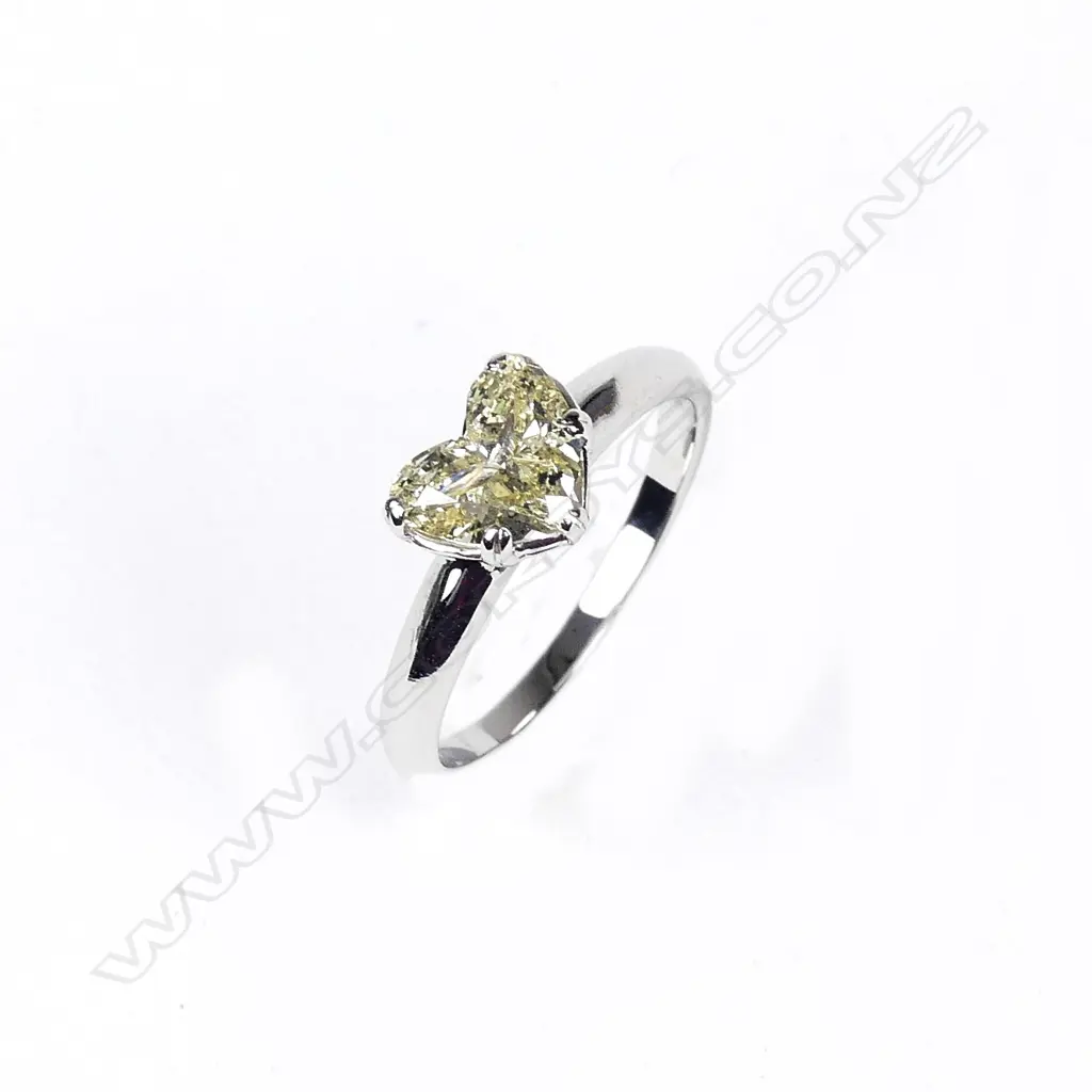 A 14ct white gold diamond solitaire ring Image 1++