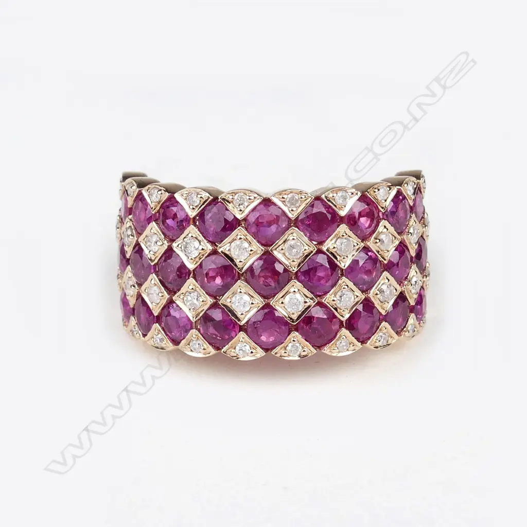 A 14ct rose gold ruby and diamond ring Image 1++