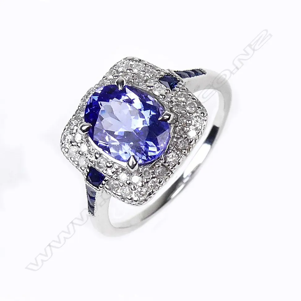 An 18ct white gold tanzanite and diamond ring Image 1++