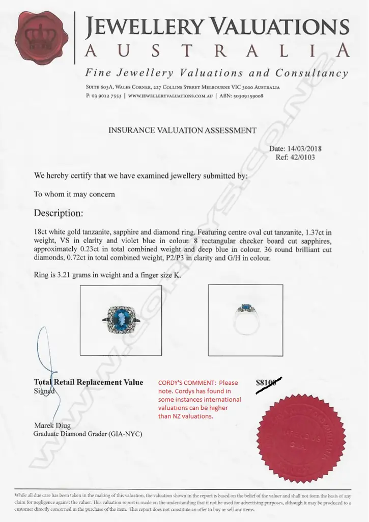 An 18ct white gold tanzanite and diamond ring Image 1++