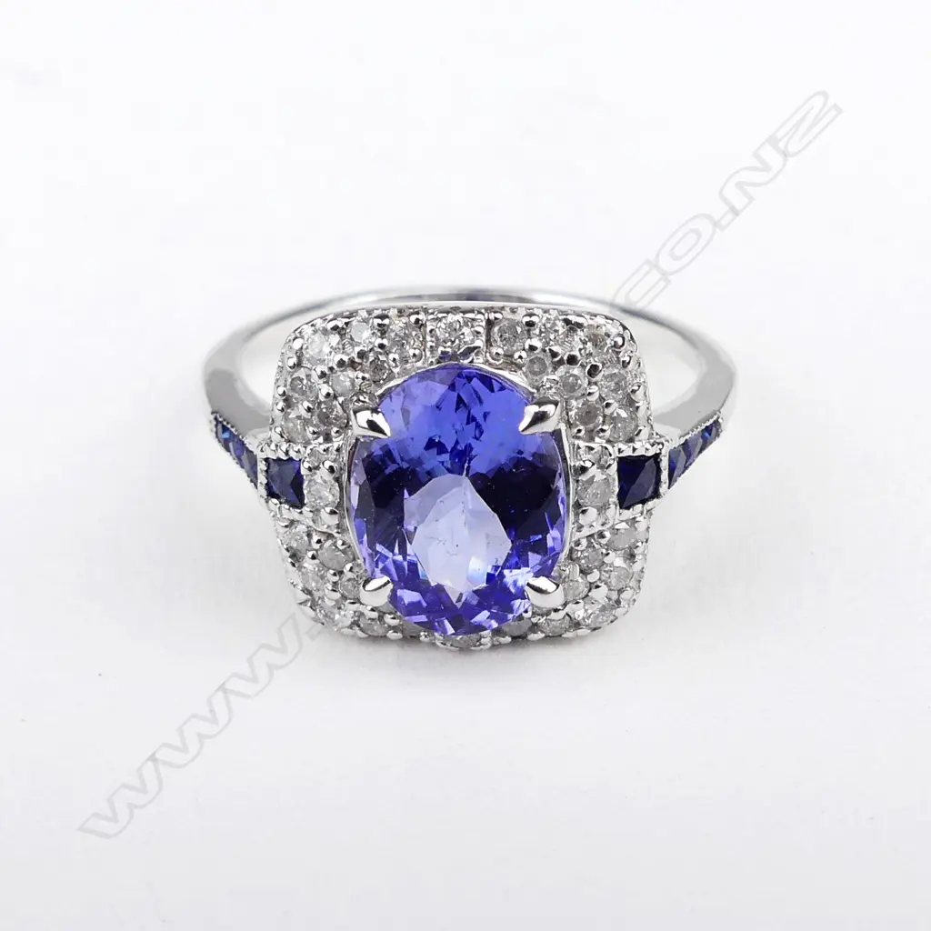 An 18ct white gold tanzanite and diamond ring Image 1++