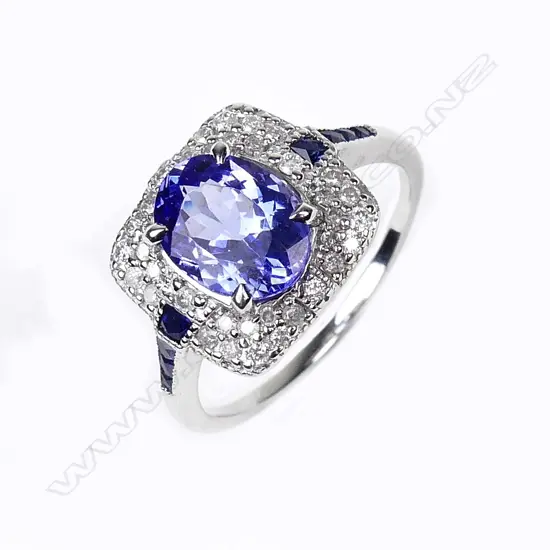 An 18ct white gold tanzanite and diamond ring
