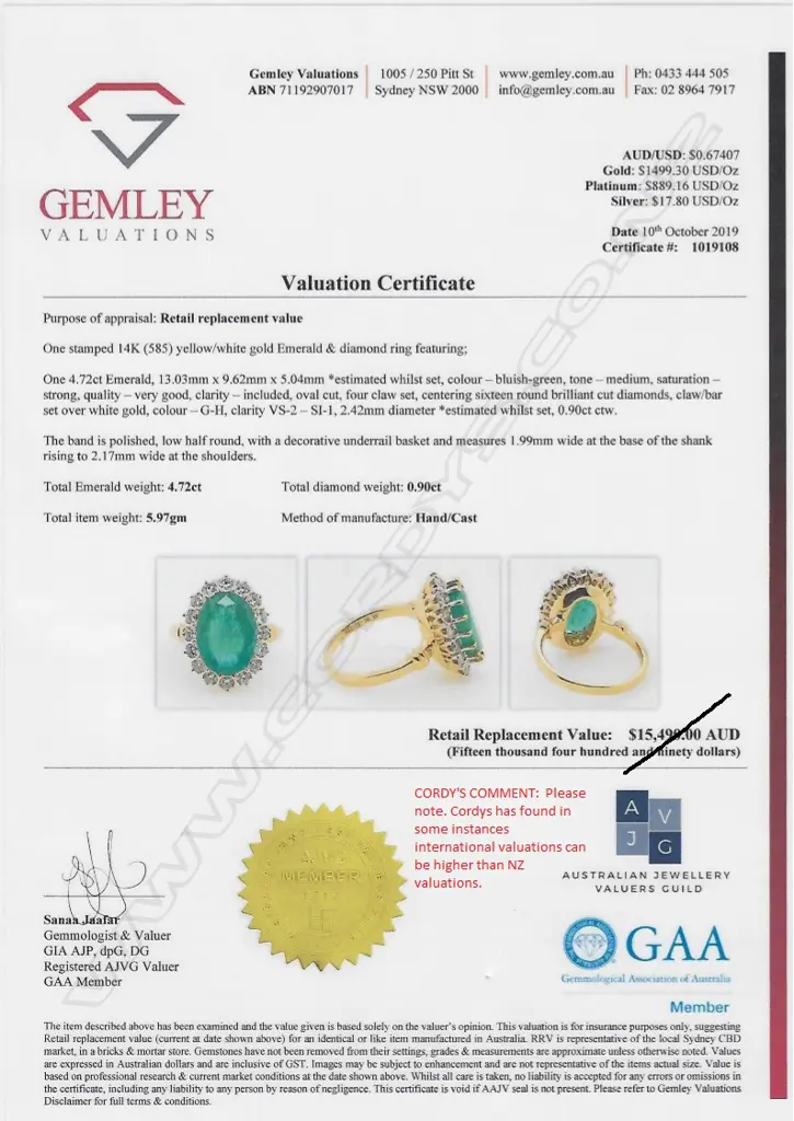 A 14ct gold emerald and diamond ring Image 1++