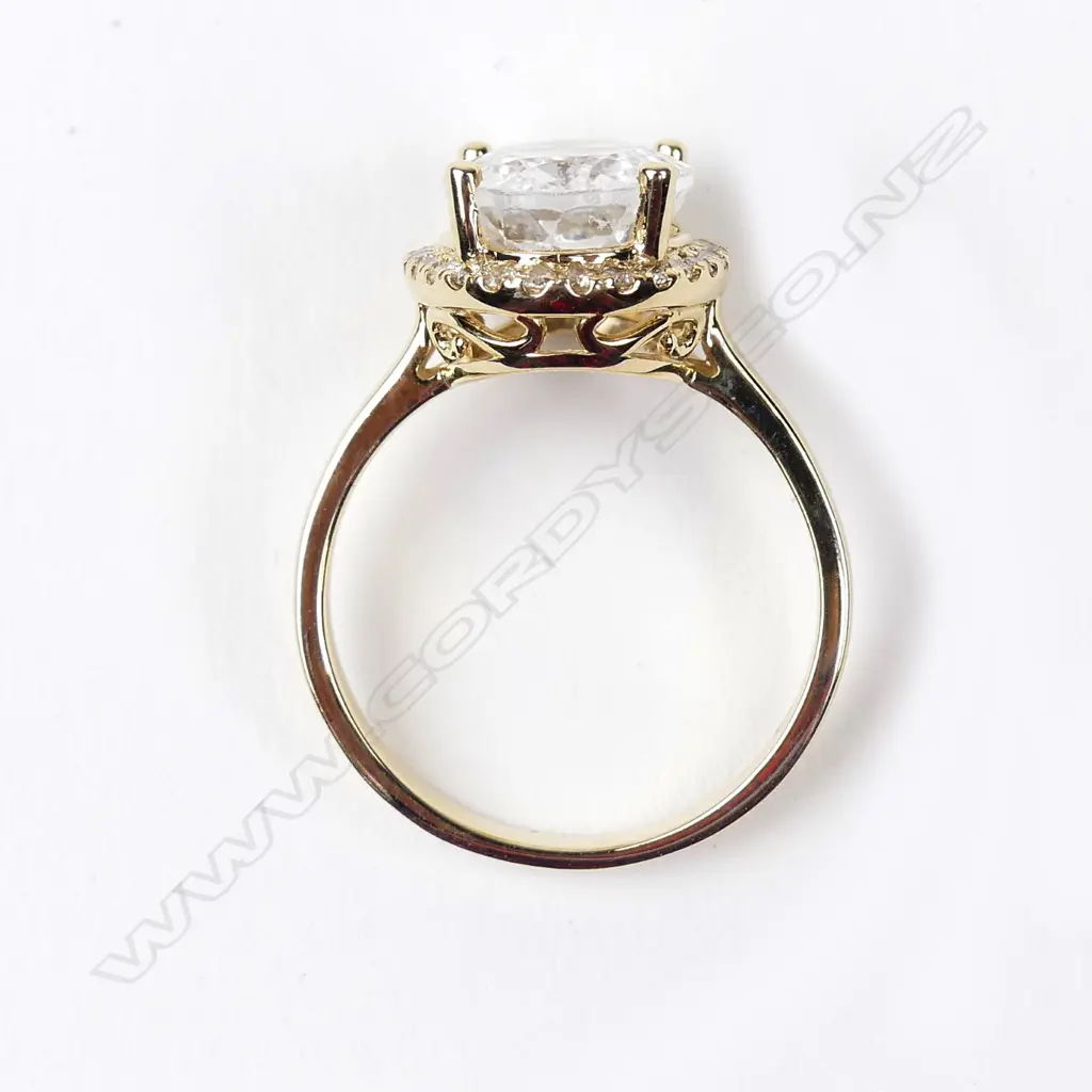 A 14ct yellow gold aquamarine and diamond ring Image 1++