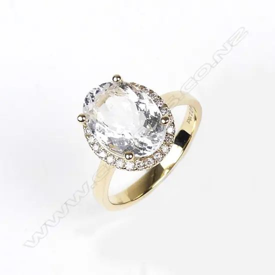 A 14ct yellow gold aquamarine and diamond ring