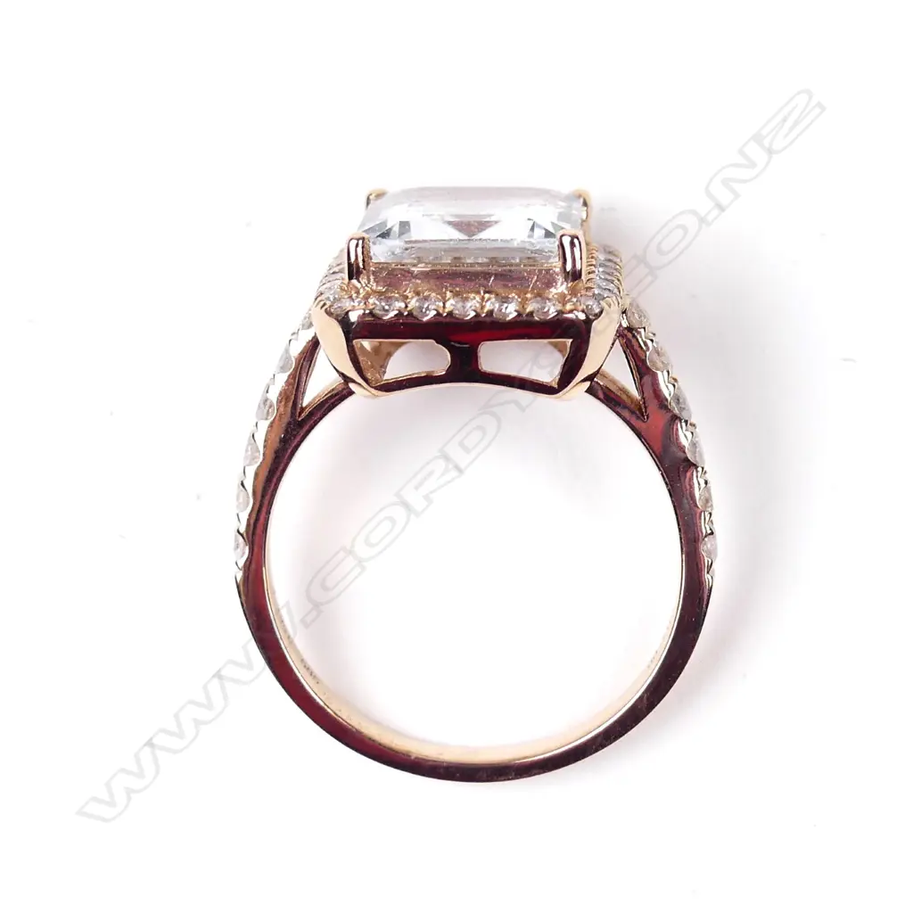 A 14ct rose gold aquamarine and diamond ring Image 1++