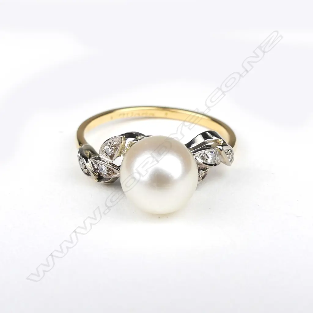 A vintage 18ct yellow and white gold pearl and diamond ring Image 1++