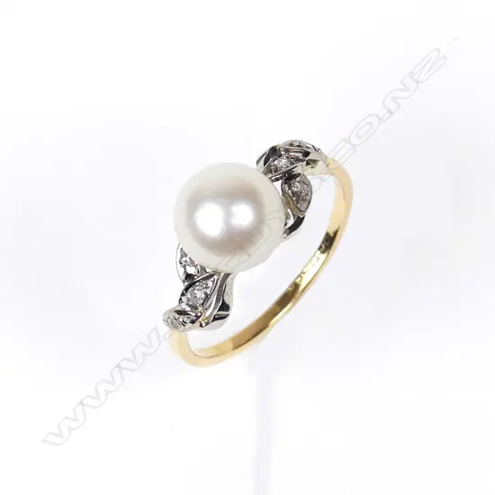A vintage 18ct yellow and white gold pearl and diamond ring