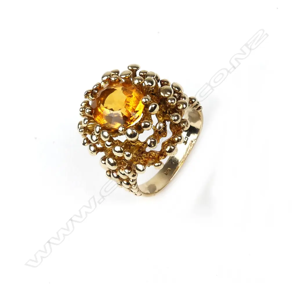 A retro 9ct gold and citrine ring Image 1++
