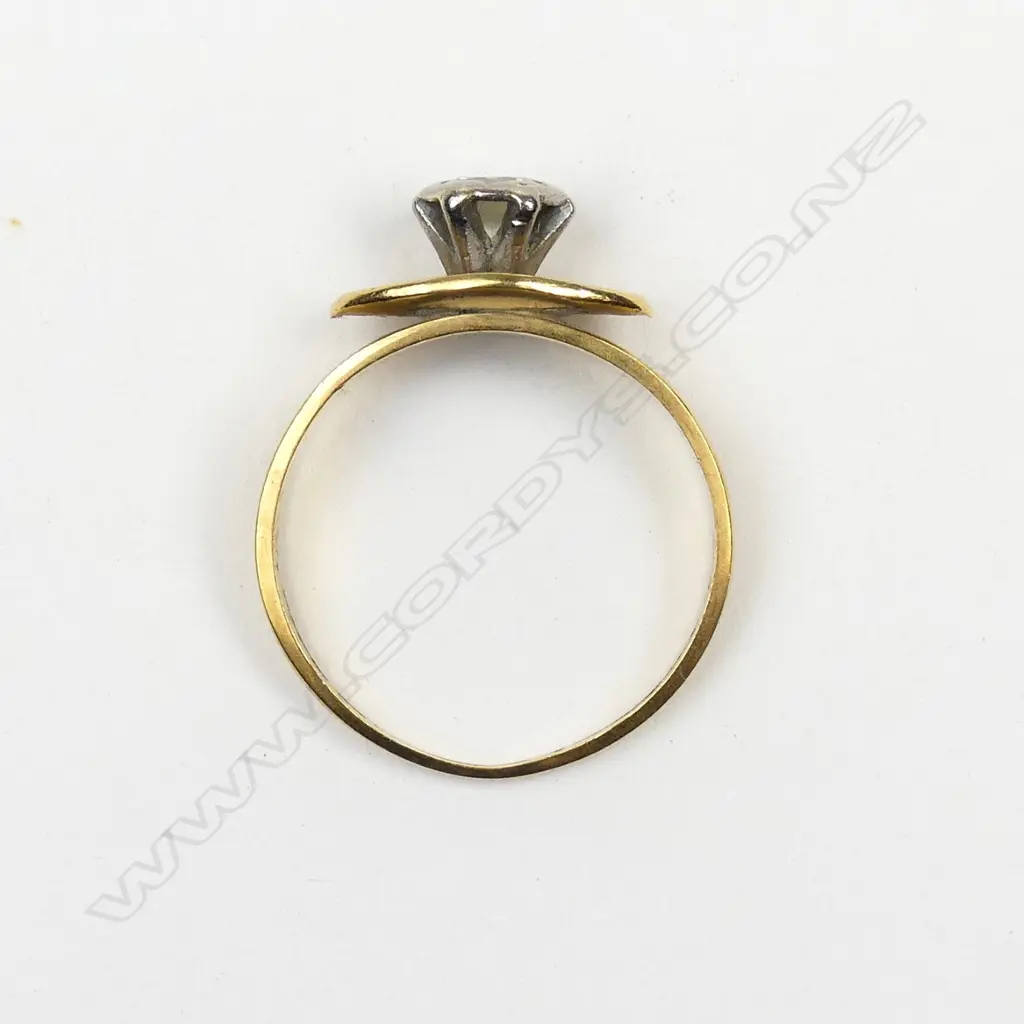 An 18ct. yellow gold and diamond solitaire ring Image 1++