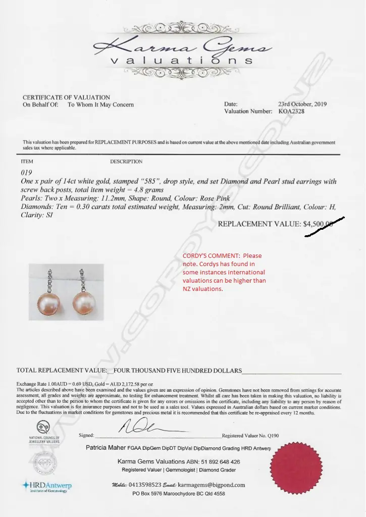 A pair of 14ct white gold pearl and diamond earrings Image 1++