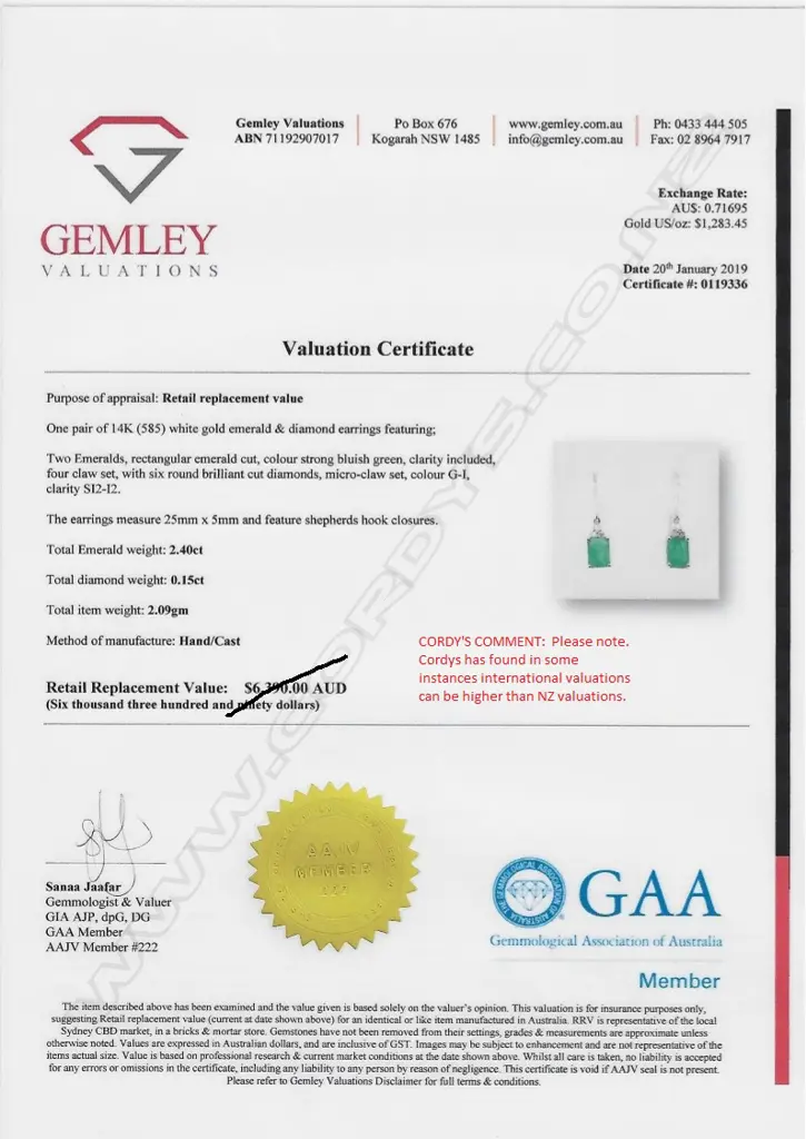 A pair of 14ct white gold emerald and diamond earrings Image 1++