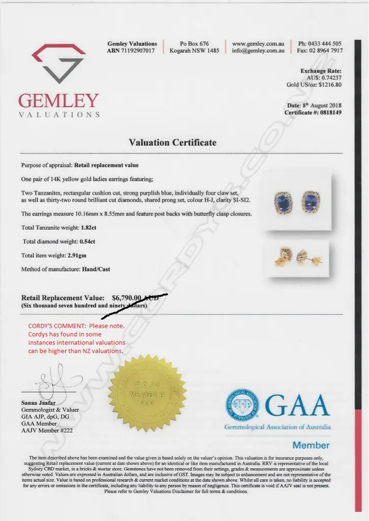 A pair of 14ct yellow gold tanzanite and diamond stud earrings Image 1++