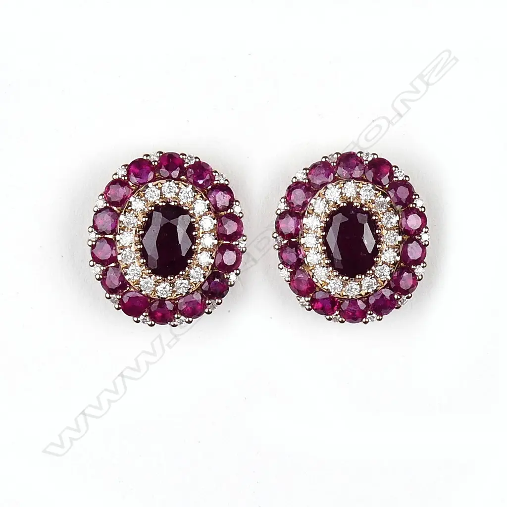 A pair of 14ct rose gold ruby and diamond earrings Image 1++