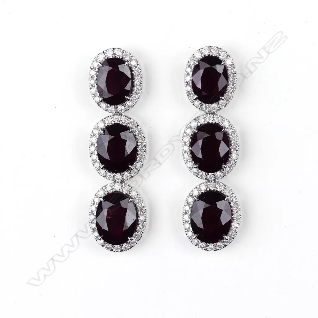 A pair of platinum ruby and diamond drop earrings Image 1++