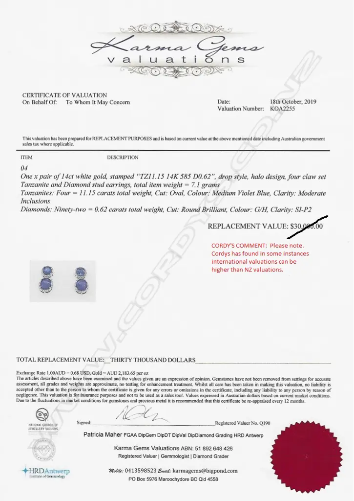 A pair of 14ct white gold tanzanite and diamond drop earrings Image 1++