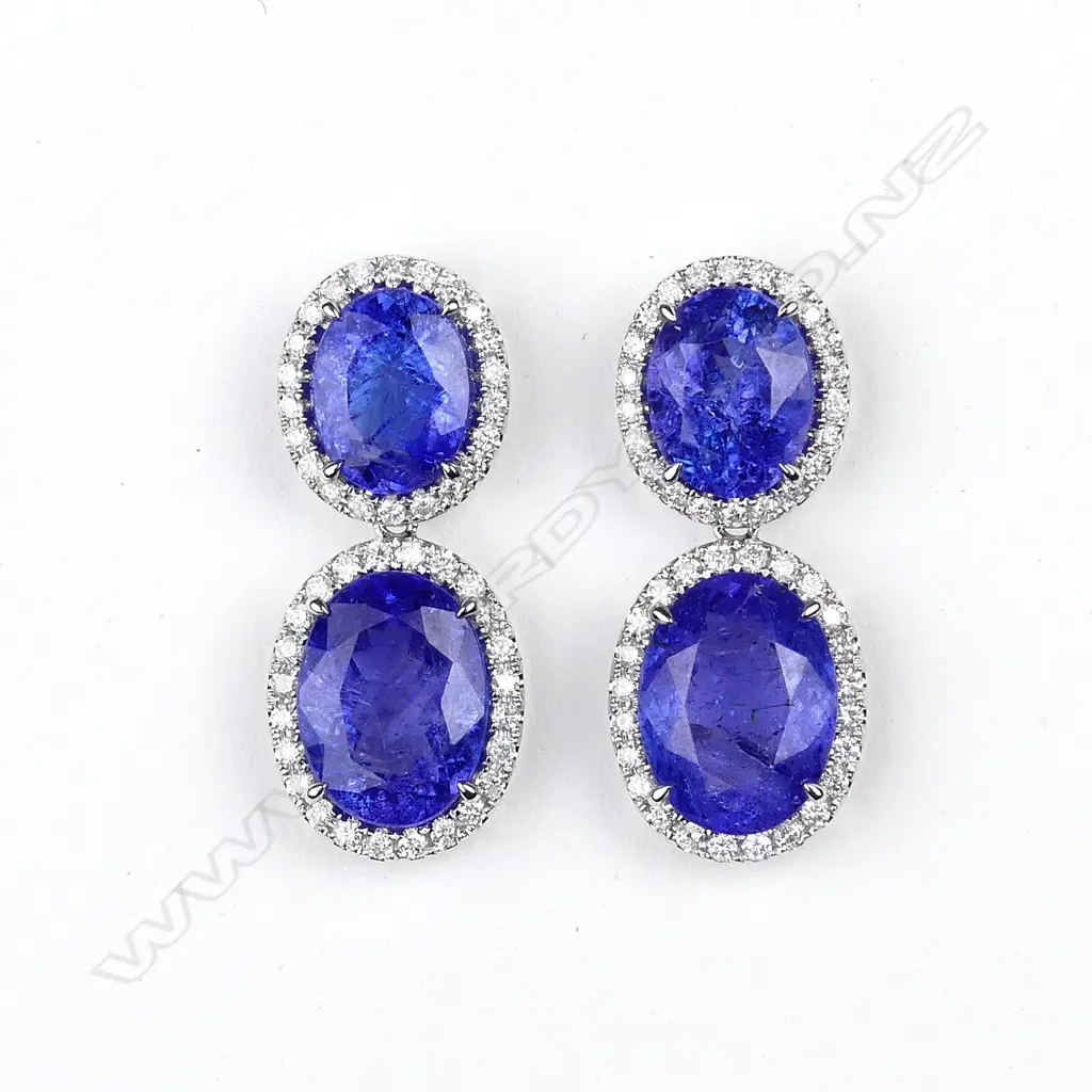 A pair of 14ct white gold tanzanite and diamond drop earrings Image 1++
