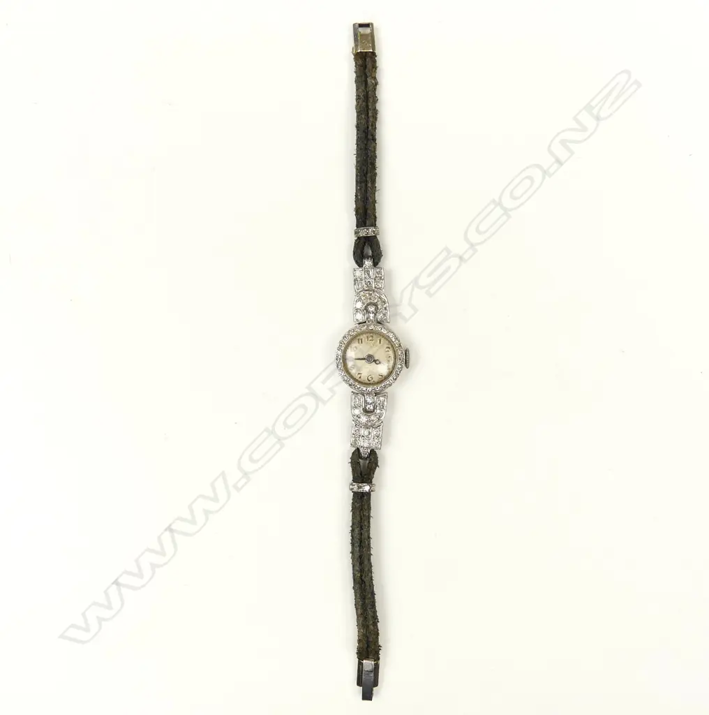 An Art Deco platinum and diamond lady's cocktail watch Image 1++