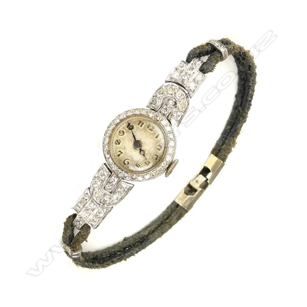 An Art Deco platinum and diamond lady's cocktail watch Image 1++