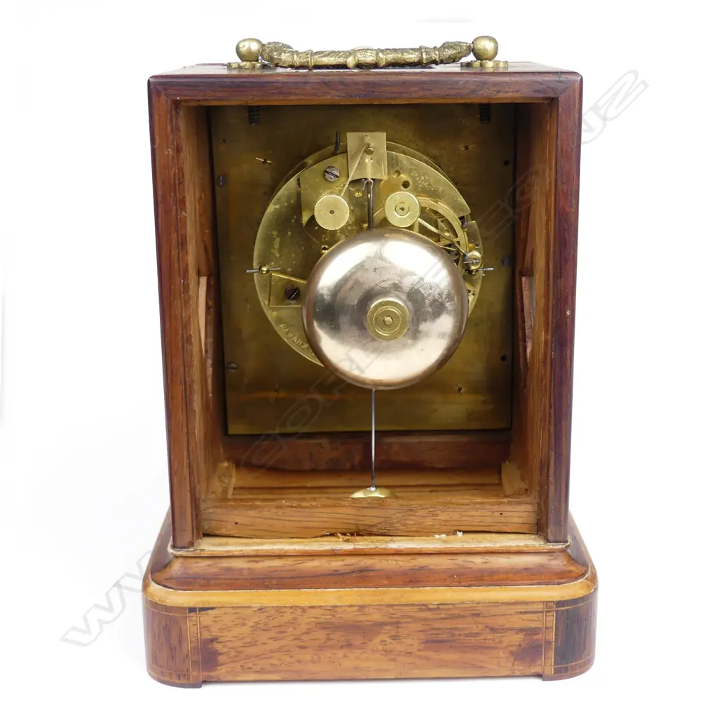 A rosewood cased mantel clock Image 1++