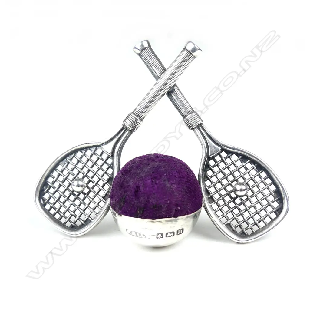 An early 1900s silver pin cushion Image 1++