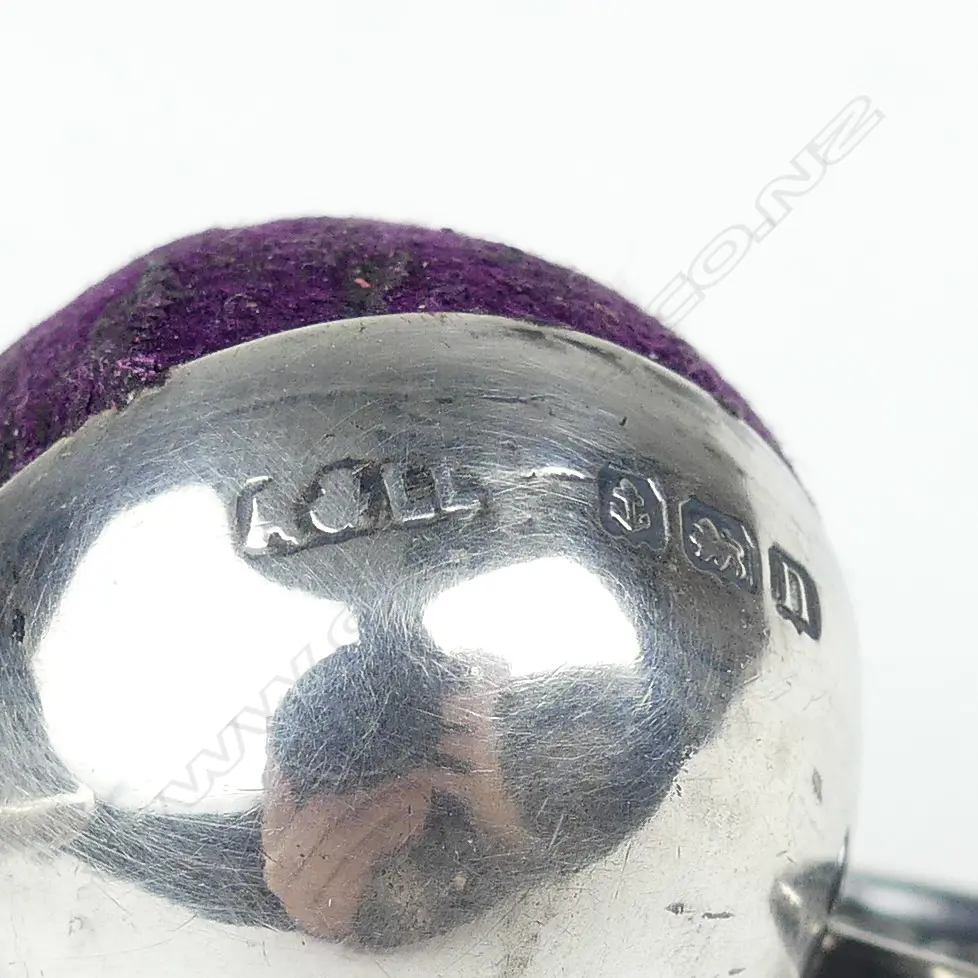 An early 1900s silver pin cushion Image 1++