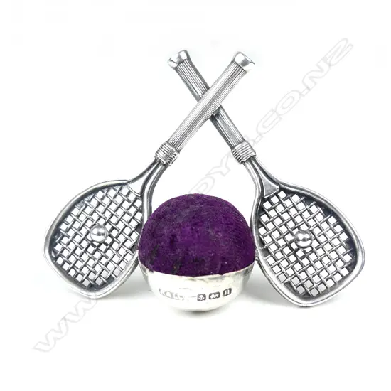 An early 1900s silver pin cushion