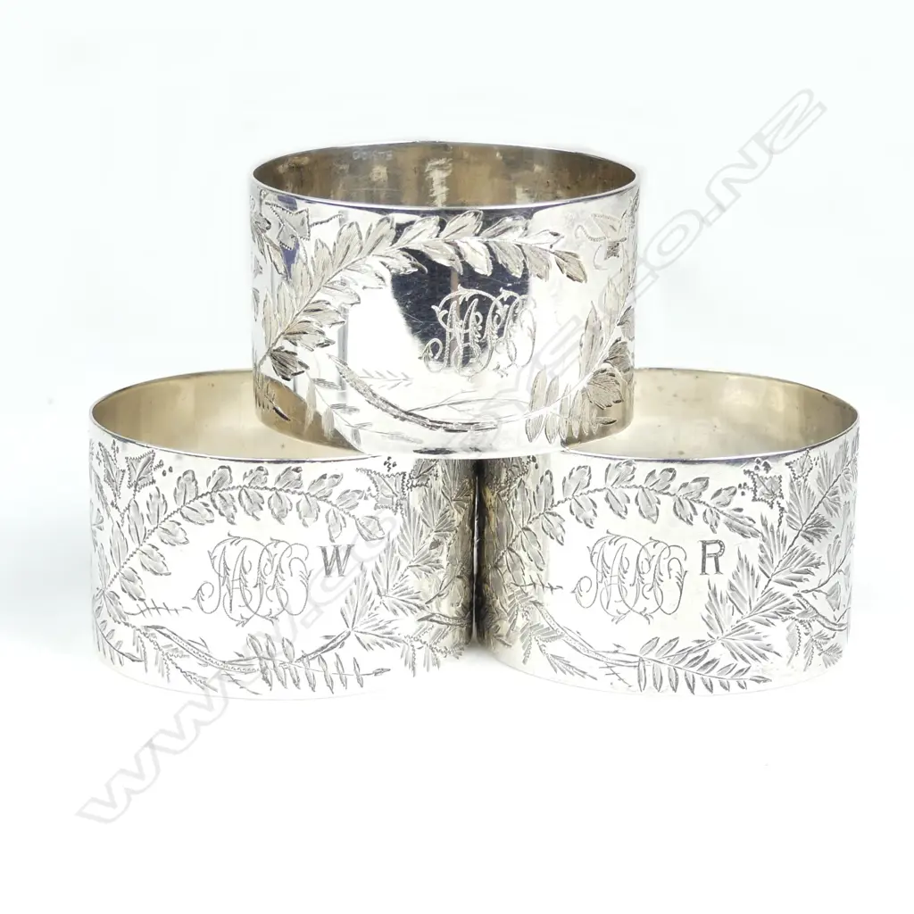 A set of three Victorian silver Arts & Crafts napkin rings Image 1++
