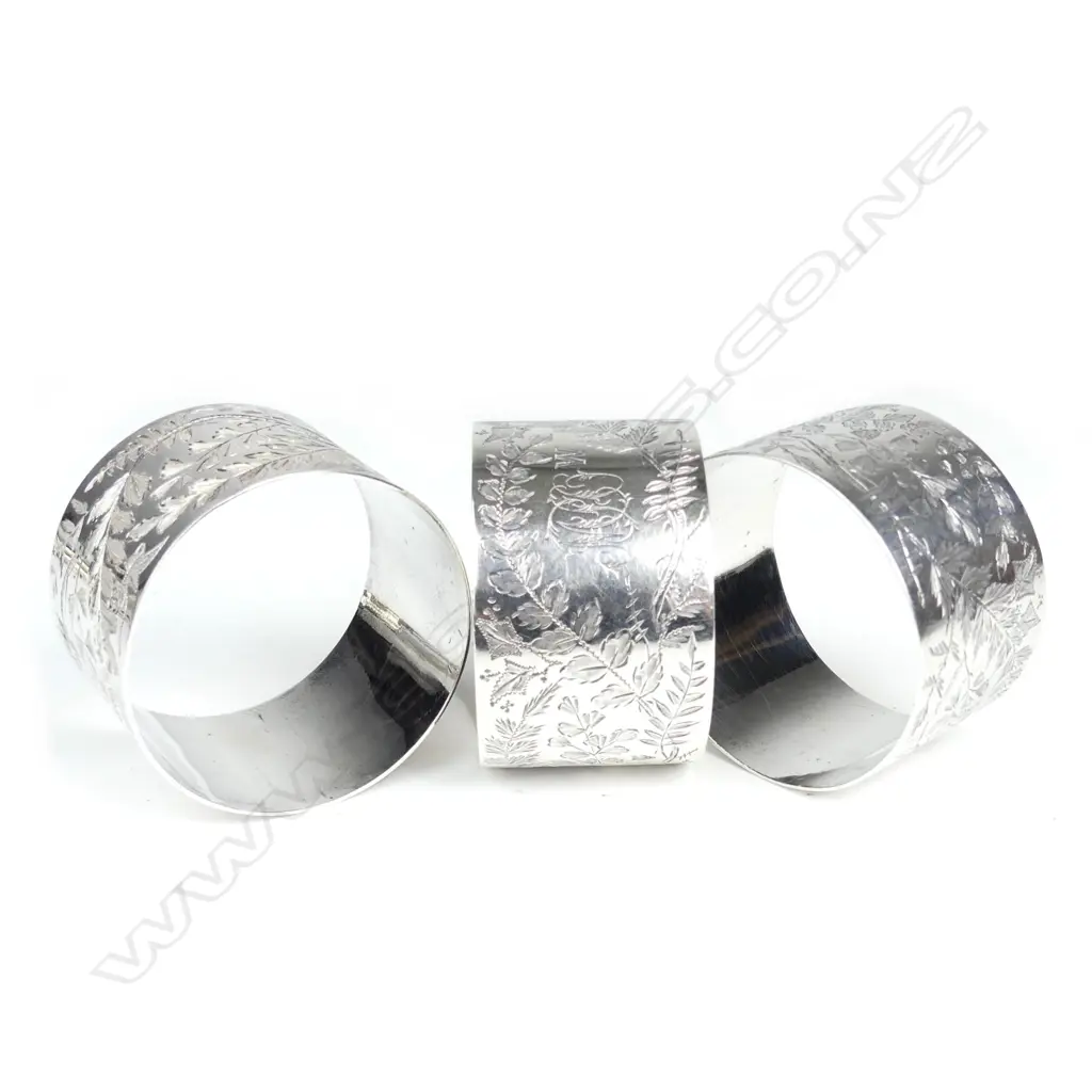 A set of three Victorian silver Arts & Crafts napkin rings Image 1++