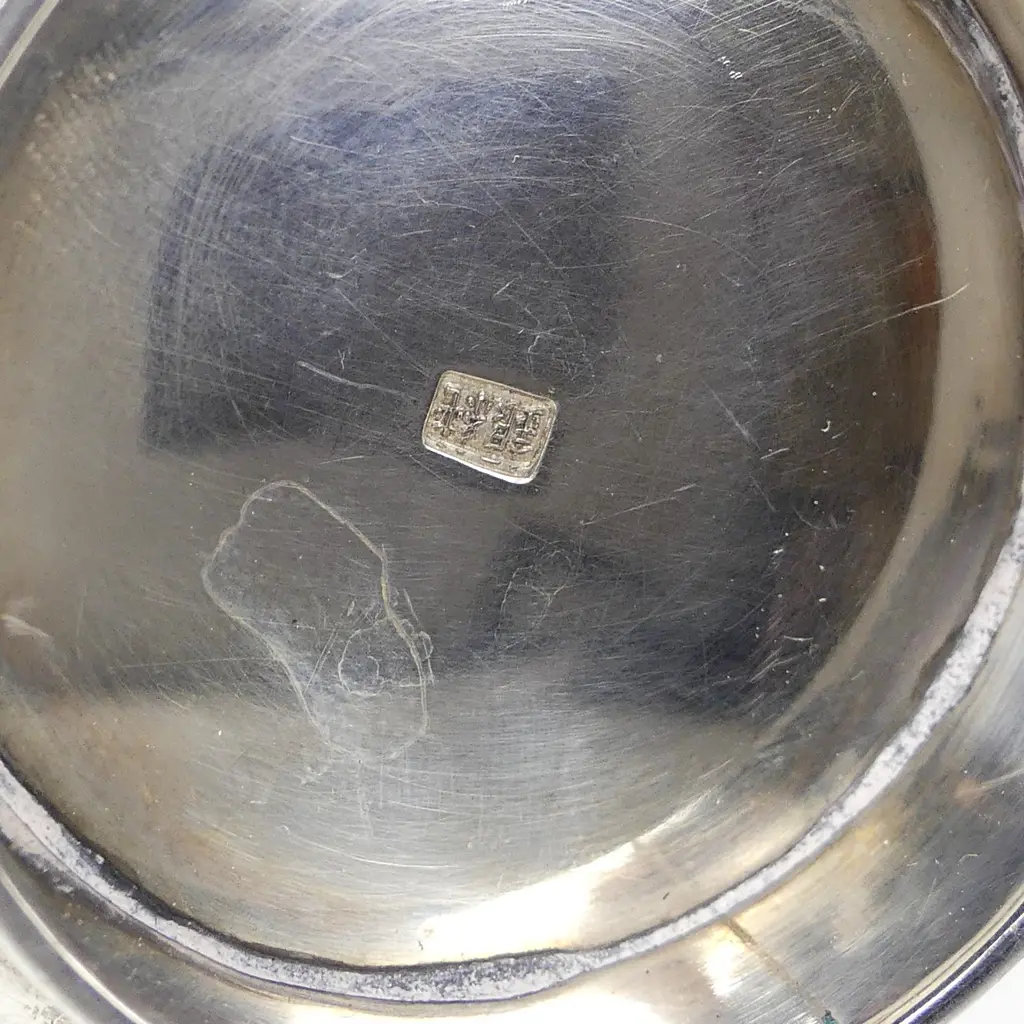 A Japanese Meiji iris decorated three-piece silver tea set Image 1++