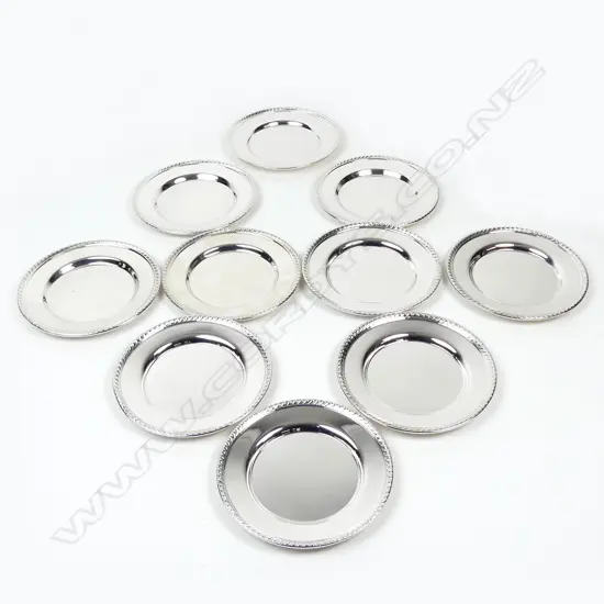 A set of ten American silver table plates