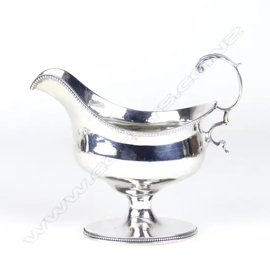 A good George III fat bellied pedestal sauce boat