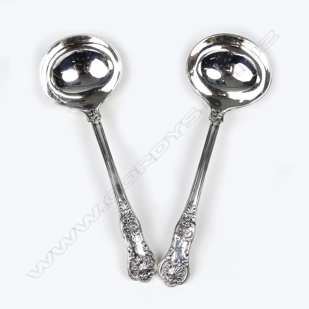 A pair of early Victorian silver sauce ladles Image 1++