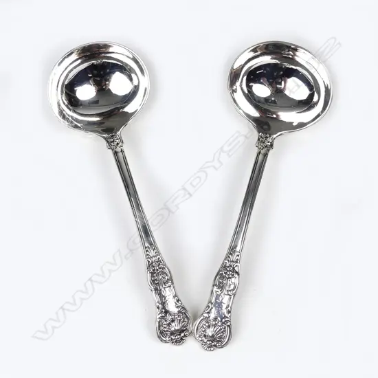 A pair of early Victorian silver sauce ladles