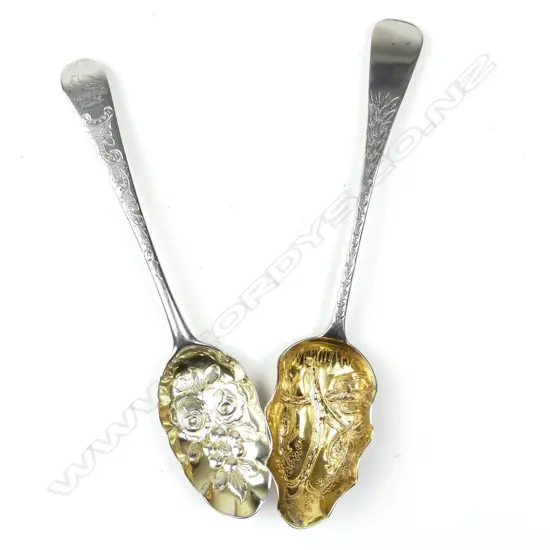 Two silver berry spoons