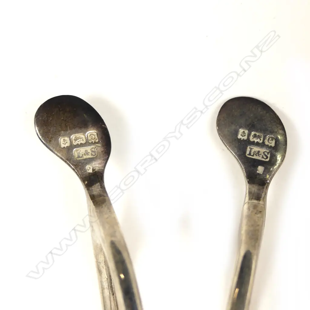 Two pair of silver wishbone sugar tongs Image 1++