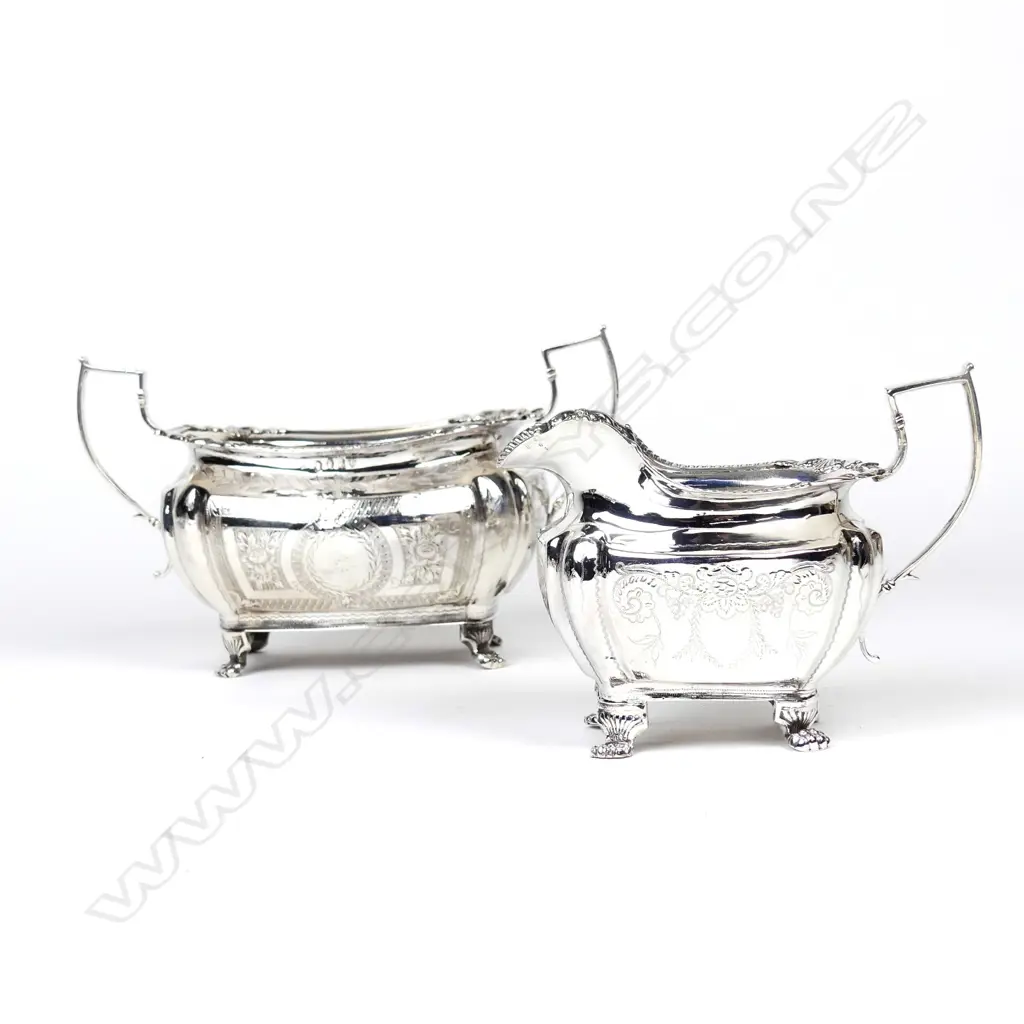 A pair of George IV Irish silver sugar bowl and cream jug Image 1++