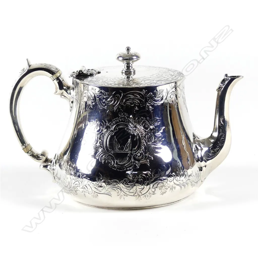 A Victorian silver teapot Image 1++